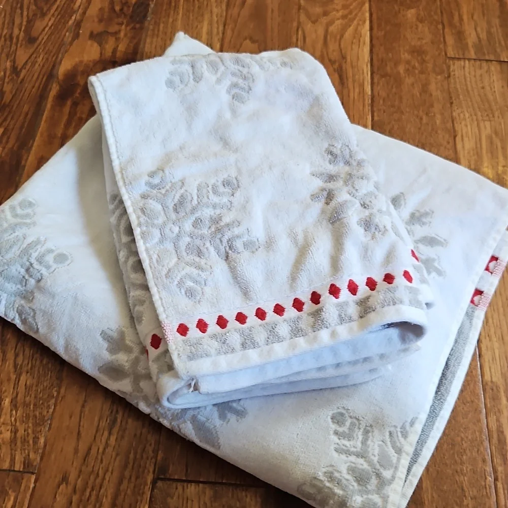 Snowflake Patterned Towel with Red Accents